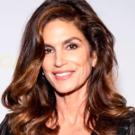 Cindy Crawford Engages in Ridiculous Sauna Video Play with Her "Baby Hairs"