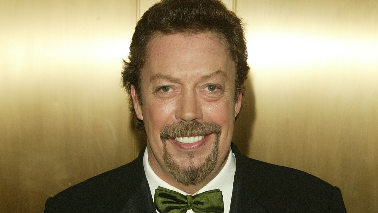 is tim curry gay